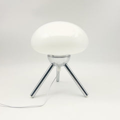 Mushroom-shaped glass table lamp with metal tripod base, bedroom bedside ambient light