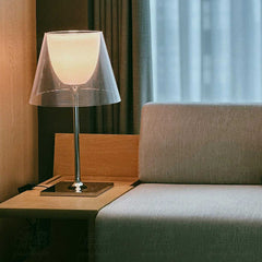 Acrylic floor lamp by the sofa in the living room and bedroom