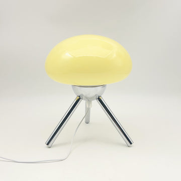 Mushroom-shaped glass table lamp with metal tripod base, bedroom bedside ambient light
