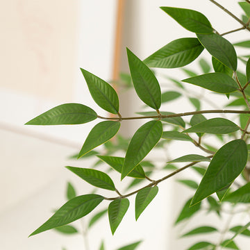 Artificial flowers, fake trees, and potted plants