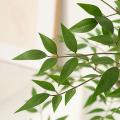 Artificial flowers, fake trees, and potted plants