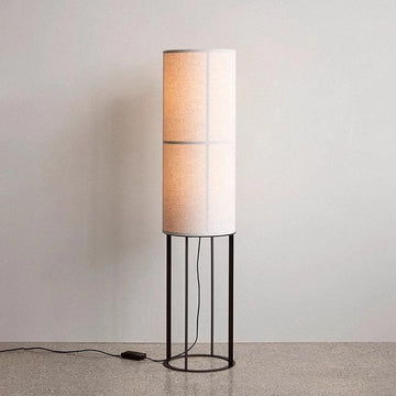 Japanese-style vintage fabric floor lamp beside the living room sofa, mid-century wabi-sabi style bedside atmosphere lamp for guesthouse or bedroom