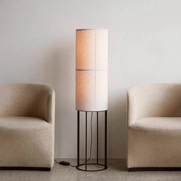Japanese-style vintage fabric floor lamp beside the living room sofa, mid-century wabi-sabi style bedside atmosphere lamp for guesthouse or bedroom